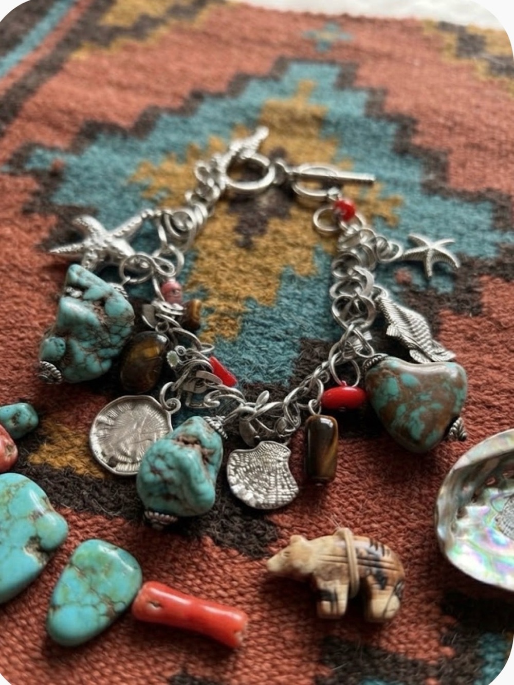 Avon Silvertone charm bracelet and earrings
